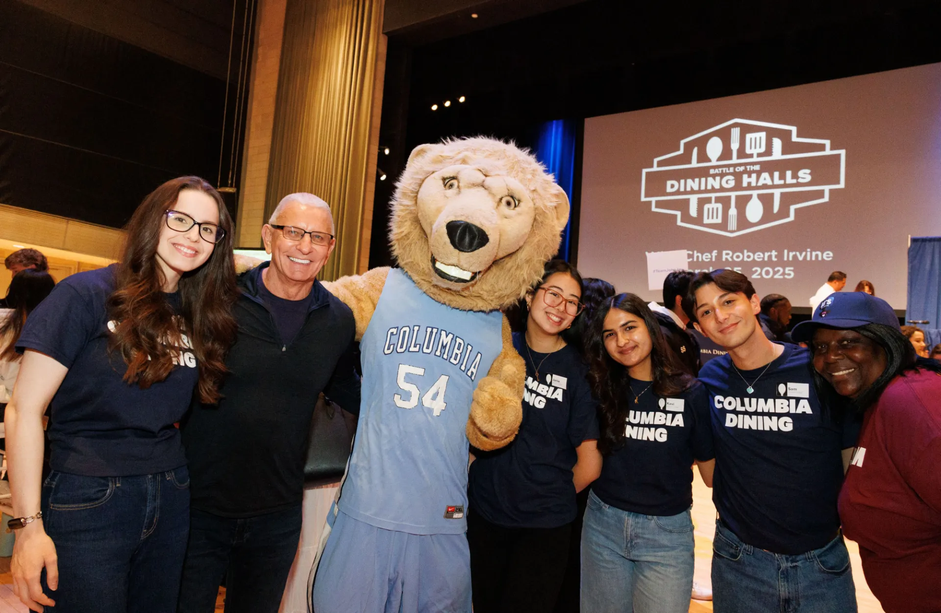 Chef Robert Irvine stands with Roaree and other student judges at the 2025 Battle of the Dining Halls event.