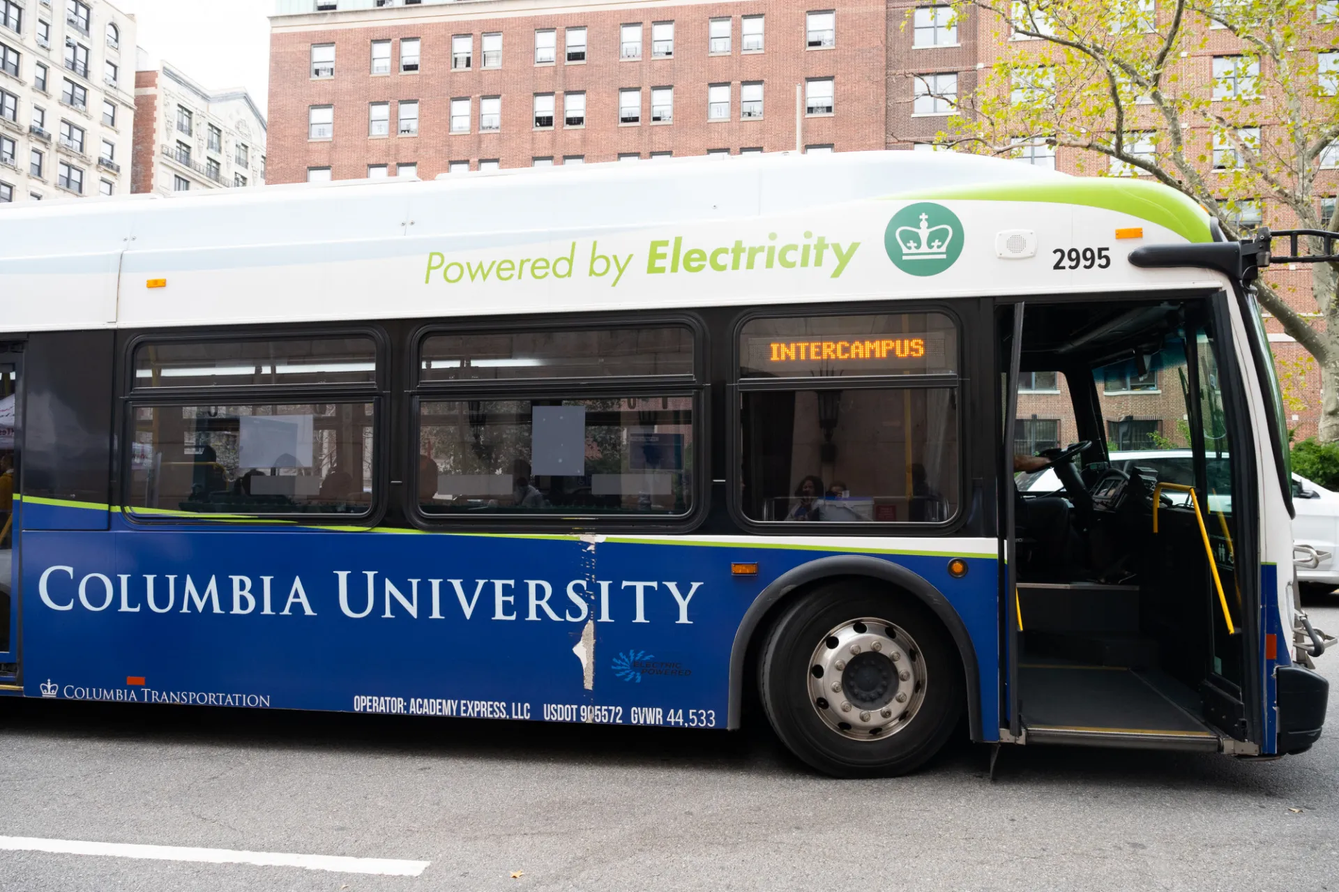 The Columbia Intercampus shuttle drives by Broadway.