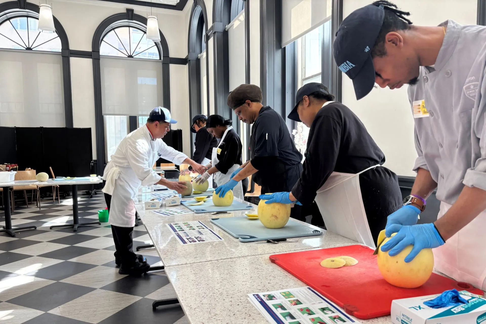 Chef Mike leads a knife class for Columbia Dining employees.